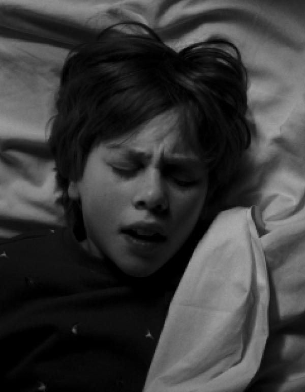 Jeremy gasping for air after he removed the blanket from his face.