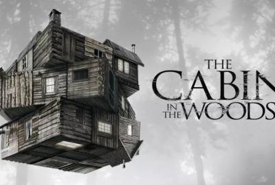 The Cabin in the Woods movie poster with house floating in the woods 