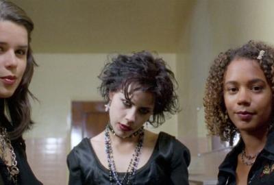 Trio of outcast teenage girls looks on
