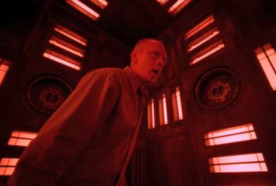 Cube Zero A man walks through an ominous construct of cubeshaped rooms