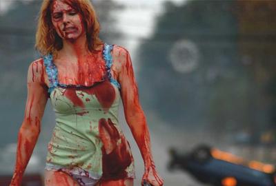 Feast 2: Sloppy Seconds woman covered in blood walks down the street