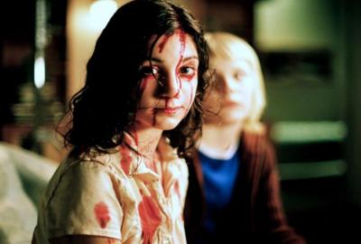 Let The Right One In bloodied young girl