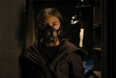 Monsters film still girl with mask on 