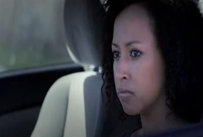 SEVER woman in her car stares at someone 